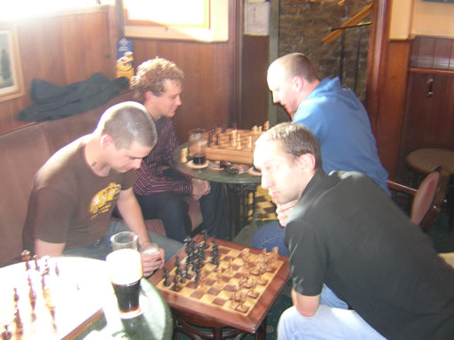 Clockwise - st00p1dfac3, Sjeg, Huck and Rossroe. Please notice the girly coke glass hiding behind the pint of guinness