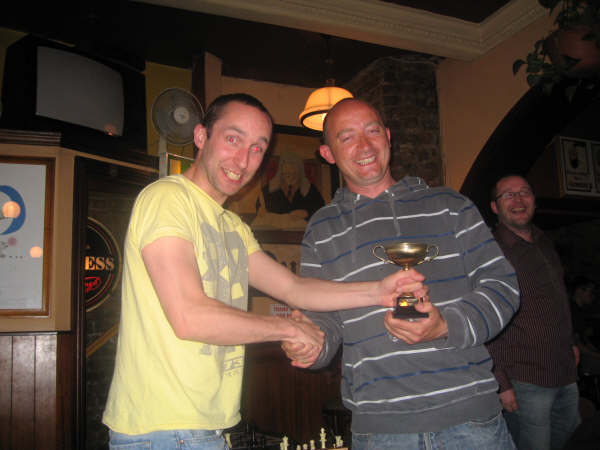 I am unsure whether rossroe is presenting this trophy or trying to steal it.