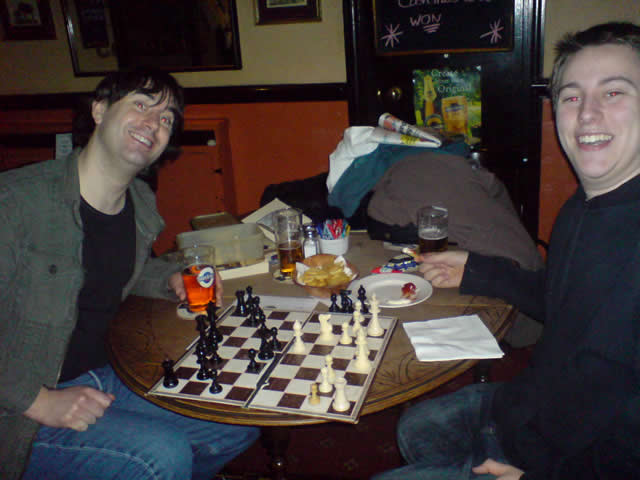 Beer, chips and chess. (Freddie and Chris)